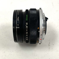 Olympus OM-System Zuiko Auto-S 50mm 1:1.8 with UV Leans and Cap