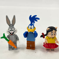 Ten LEGO Looney Tunes Minifigures; Taz, Road Runner, Daffy, Bugs And More
